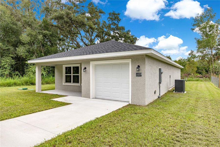 Exterior details and patio area of a home in , Summerfield (Image 14).