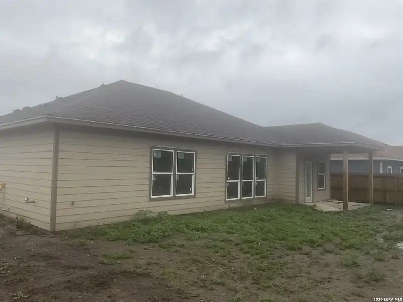 Exterior details and patio area of a home in , Beeville (Image 3).