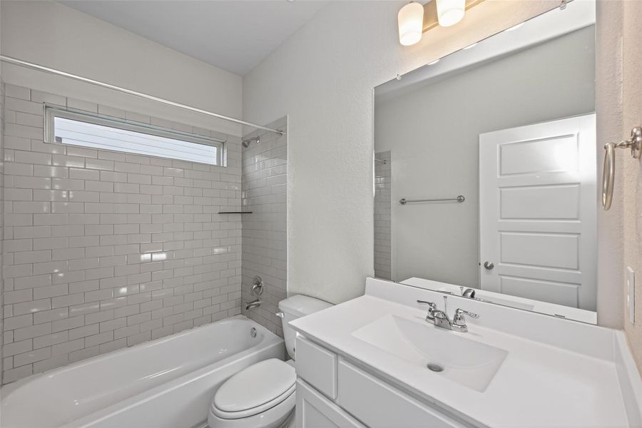 Furnished interior view inside a new home in Woodland Lakes, Huffman (Image 11).