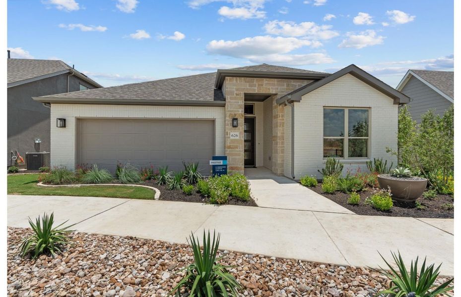 Representative exterior photo of a completed home built from the Prestige by Del Webb in Del Webb New Braunfels at Veramendi, New Braunfels, TX (Image 11).