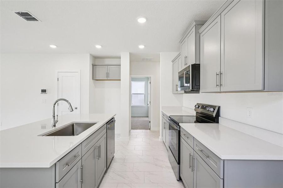 Furnished interior view inside a new home in Grasslands West, Lakeland (Image 6).
