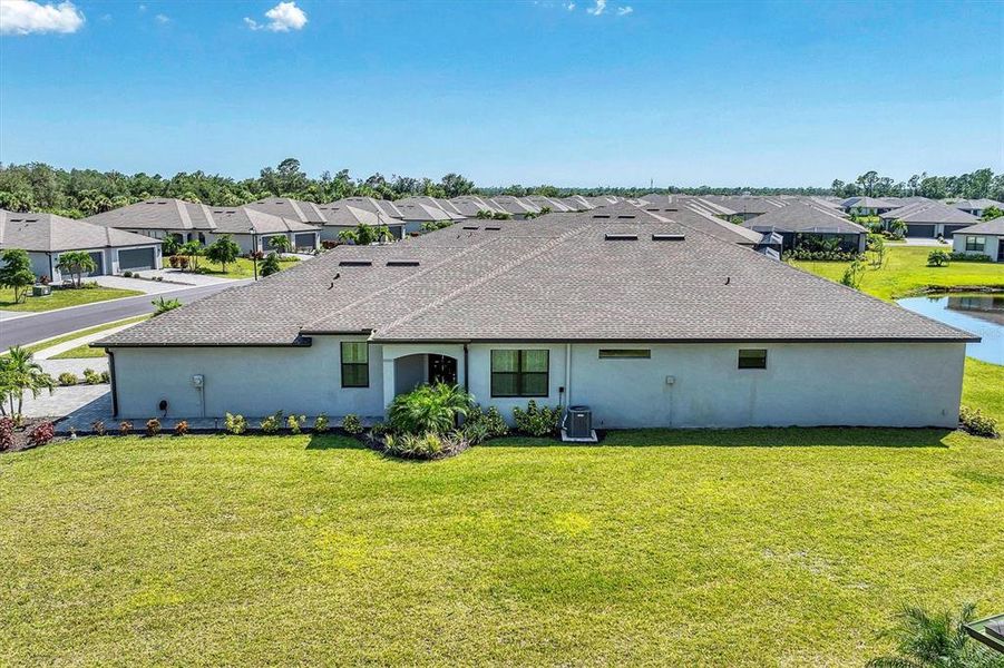 Front exterior of a new home in , Port Charlotte, FL, highlighting curb appeal (Image 18).