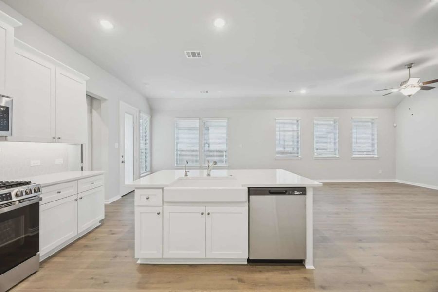 Representative furnished interior of a home built from the Sacramento by Chesmar Homes in Summer Crest, Crowley (Image 6).