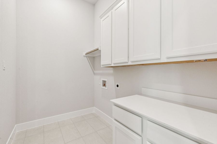 Representative furnished interior of a home built from the Hamilton by Centre Living Homes in Newman Village Townhomes, Frisco (Image 14).