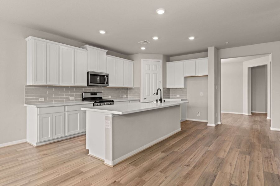 Kitchen. Note: Sample product photo - actual exterior and interior selections may vary by homesite