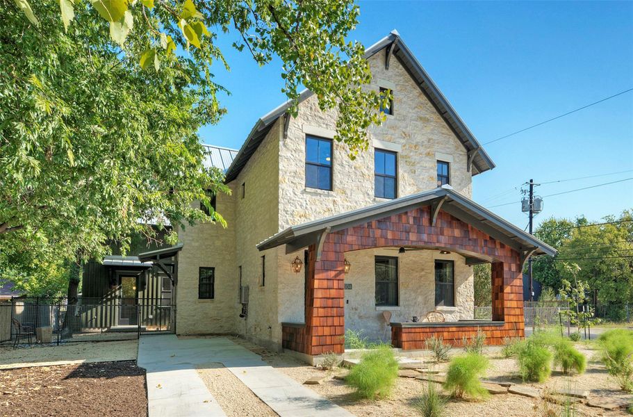 Stunning architecture with stone and cedar shake exterior.