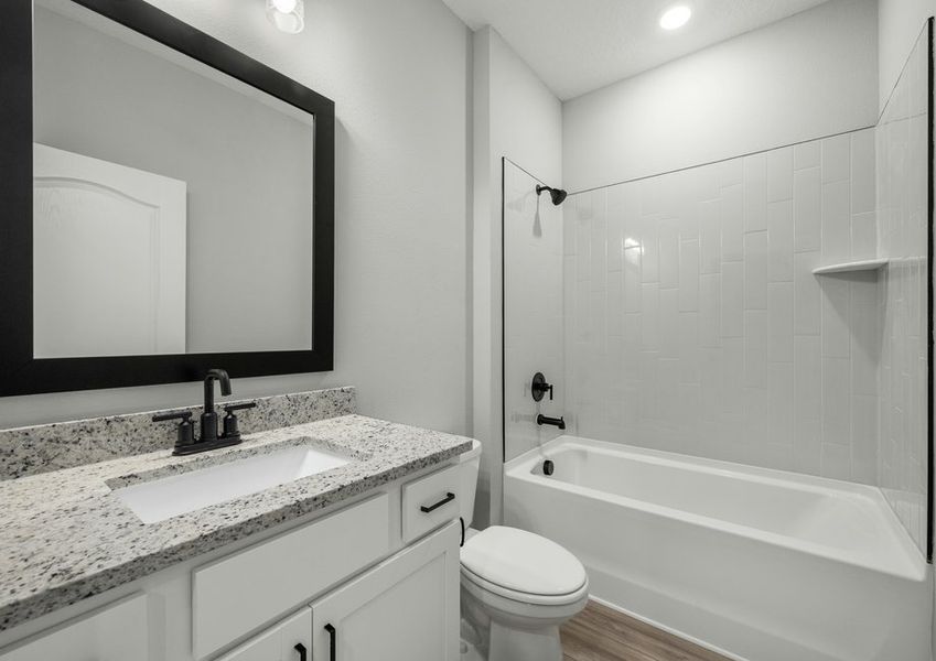 Second bathroom with a shower/tub combination