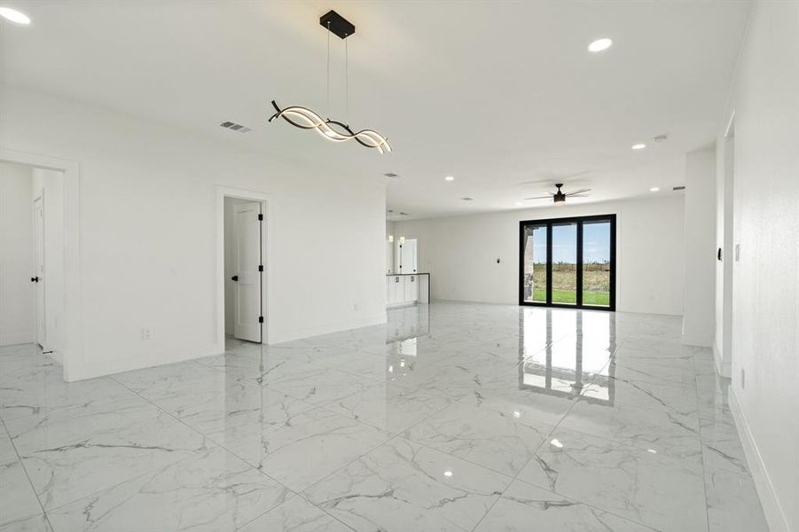 Spare room featuring ceiling fan