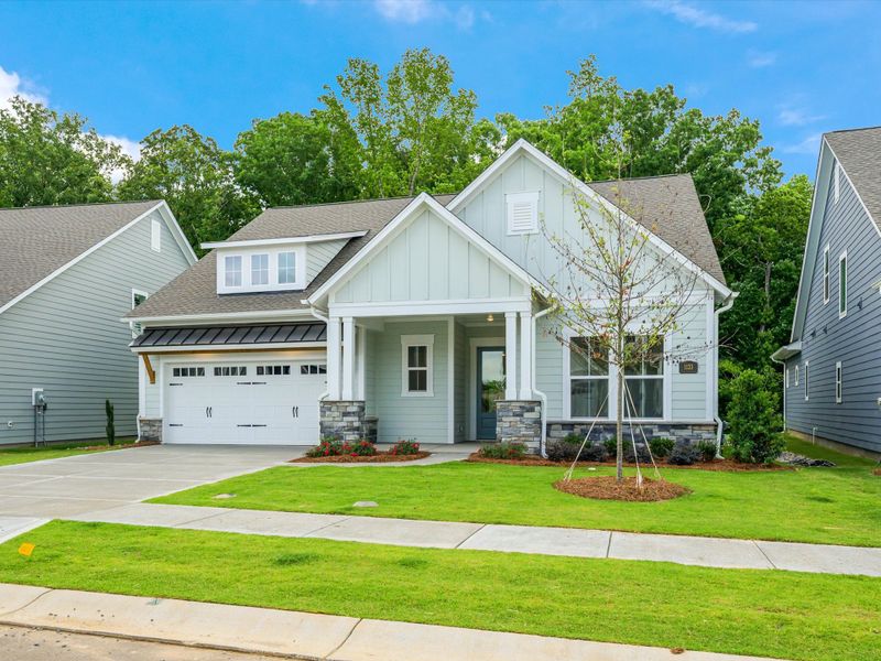 Front exterior of a new home in Encore at Streamside - Tradition Series, Waxhaw, NC, highlighting curb appeal (Image 2). Front exterior of a new home in Encore at Streamside - Tradition Series, Waxhaw, NC, highlighting curb appeal (Image 2).