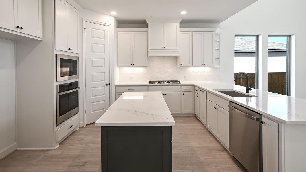 Furnished interior view inside a new home in 6 Creeks 50', Kyle (Image 9).