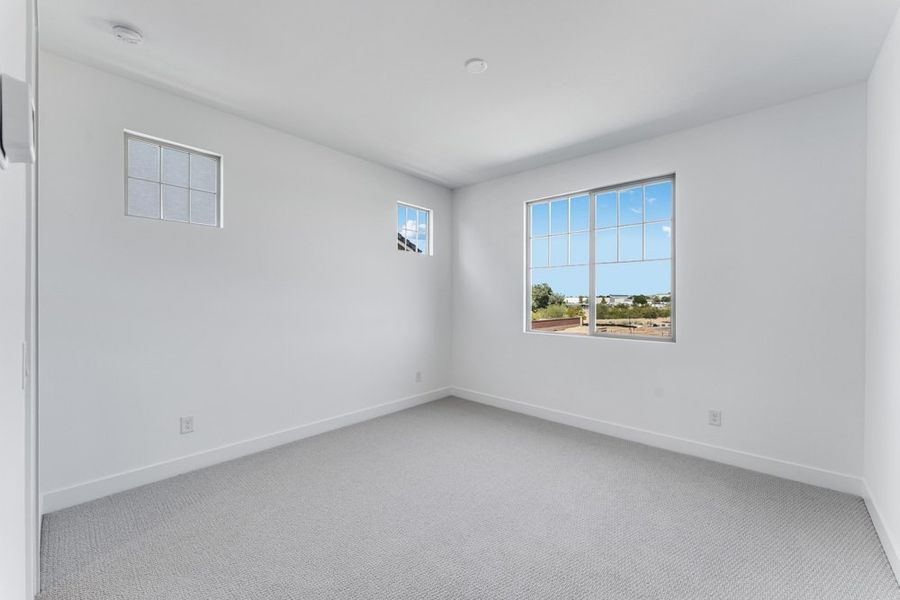 Representative unfurnished interior of a home built from the Denali by Taylor Morrison in Ellsworth Ranch Voyage Collection, Queen Creek (Image 39).