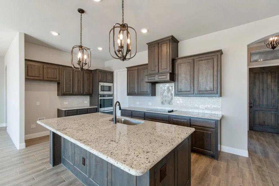 Kitchen | Concept 2586 at Hidden Creek Estates in Van Alstyne, TX by Landsea Homes