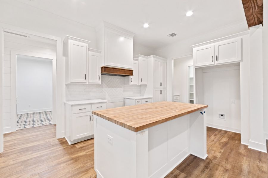 Representative furnished interior of a home built from the The Charlotte by Manuel Builders in Chapel Bend, Montgomery (Image 11).