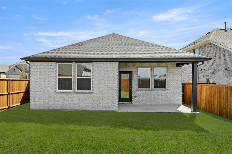 Exterior details and patio area of a home in Devonshire 40s, Forney (Image 4).
