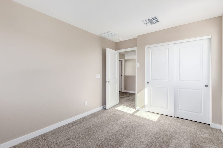 Spacious, unfurnished interior of a new home in Solvida at Estrella, Goodyear (Image 23).