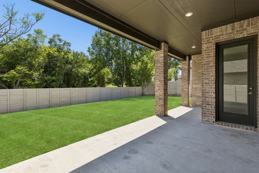 Exterior details and patio area of a home in Painted Tree Lakeside, McKinney (Image 21).