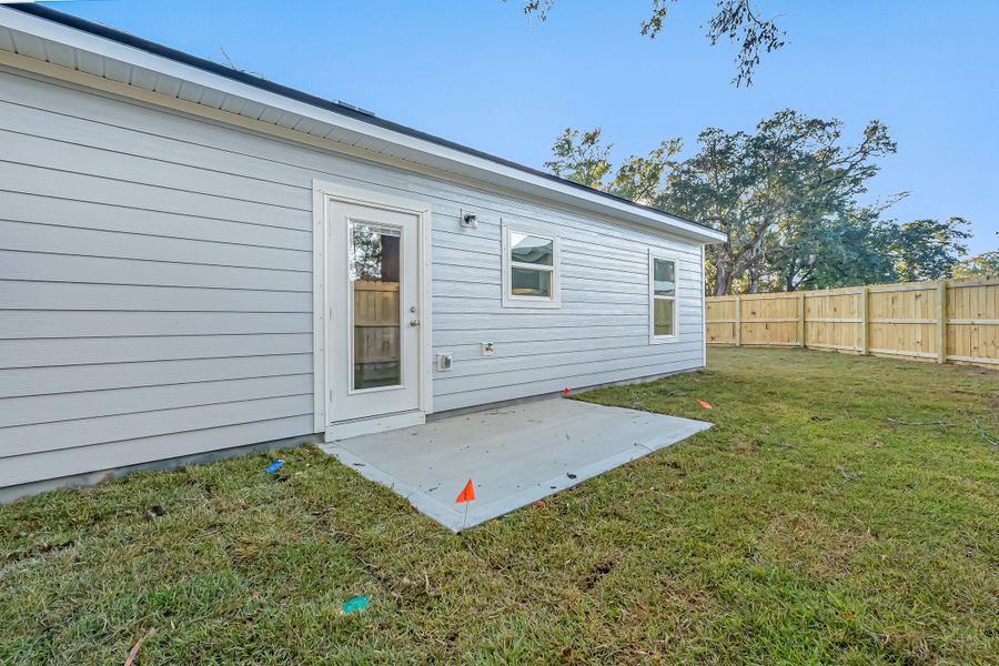 Exterior details and patio area of a home in Live Oak Cottages, Freeport (Image 26). Exterior details and patio area of a home in Live Oak Cottages, Freeport (Image 26).