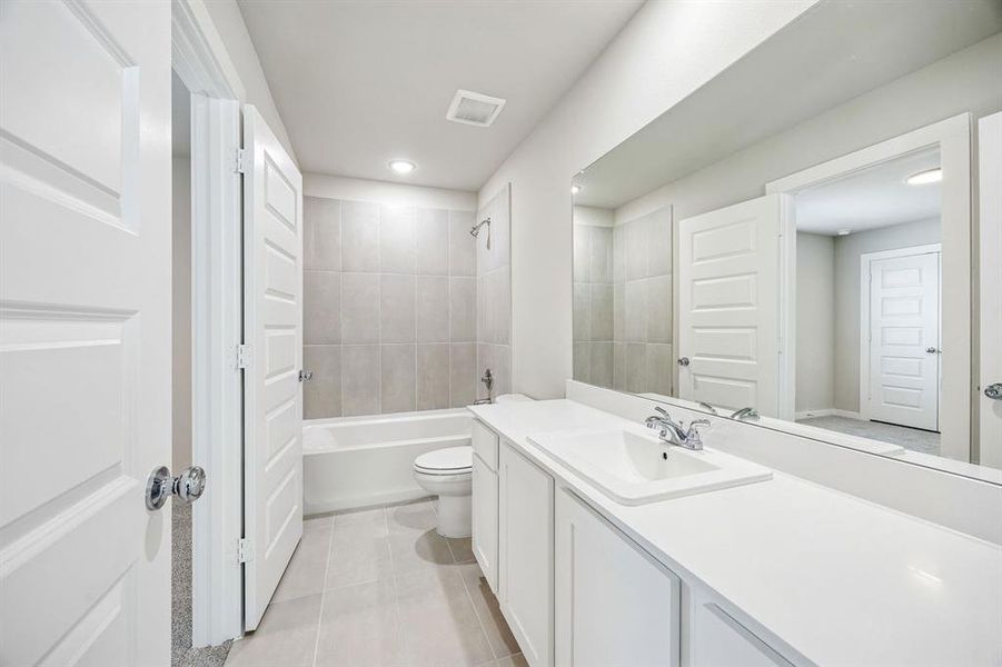 Bathroom in the Willow home plan by Trophy Signature Homes – REPRESENTATIVE PHOTO