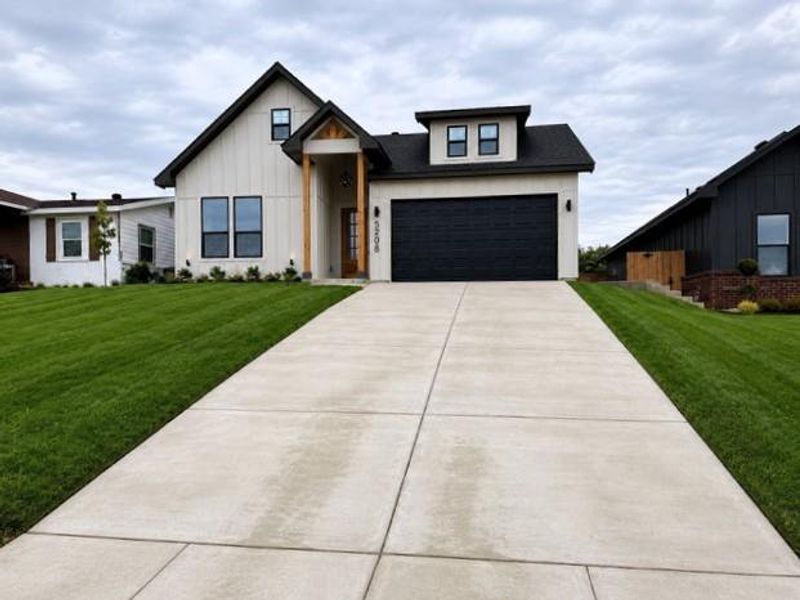 Front exterior of a new home in , Fort Worth, TX, highlighting curb appeal (Image 1). Front exterior of a new home in , Fort Worth, TX, highlighting curb appeal (Image 1).