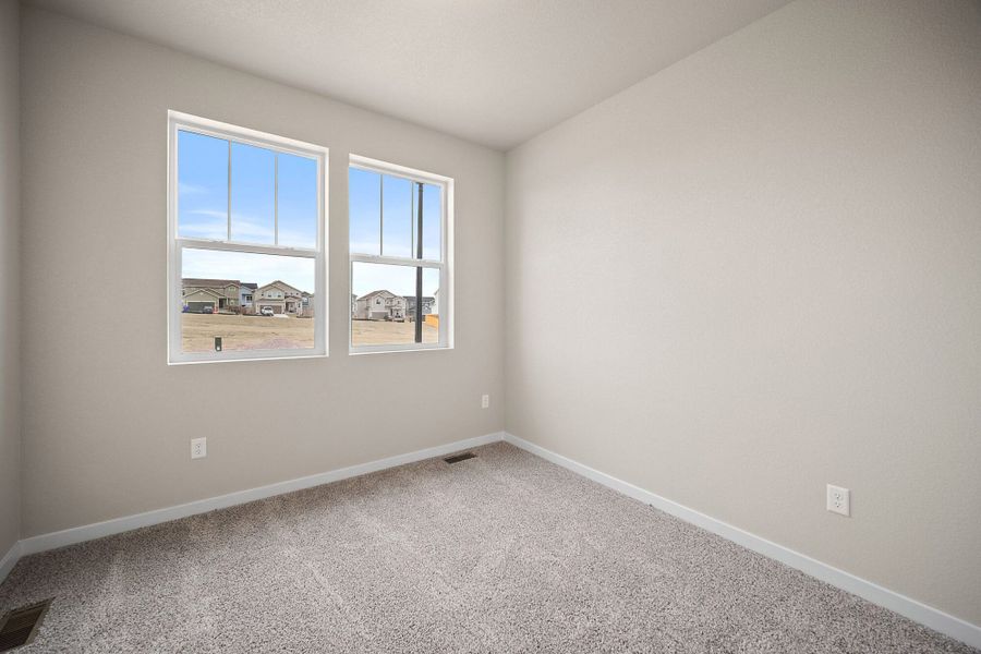 Spacious, unfurnished interior of a new home in Ridge at Lorson Ranch, Colorado Springs (Image 18).