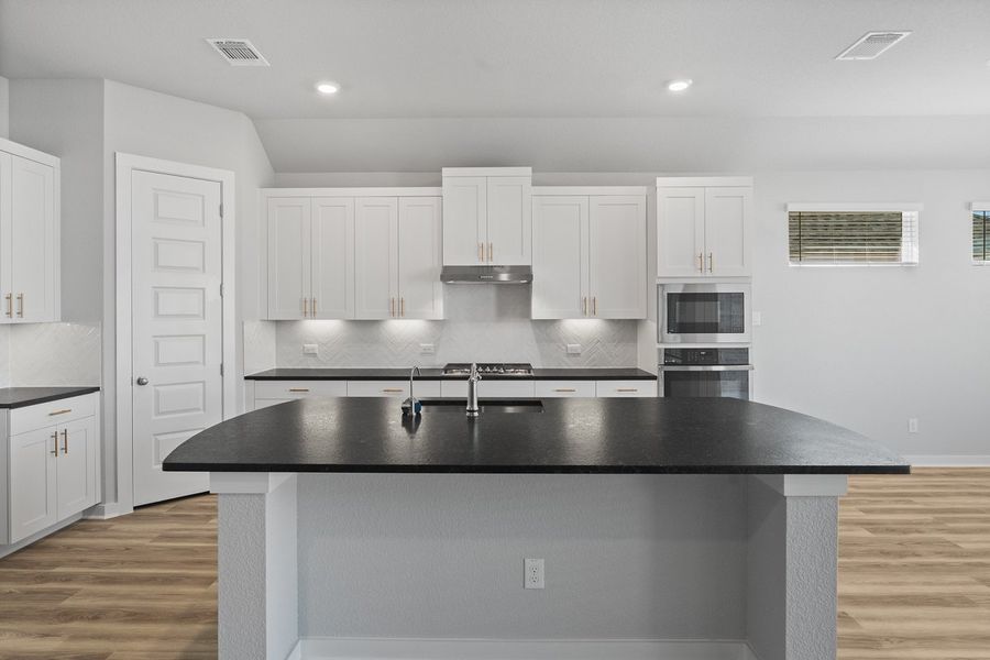 Furnished interior view inside a new home in The Grove at Blackhawk, Pflugerville (Image 9). Furnished interior view inside a new home in The Grove at Blackhawk, Pflugerville (Image 9).