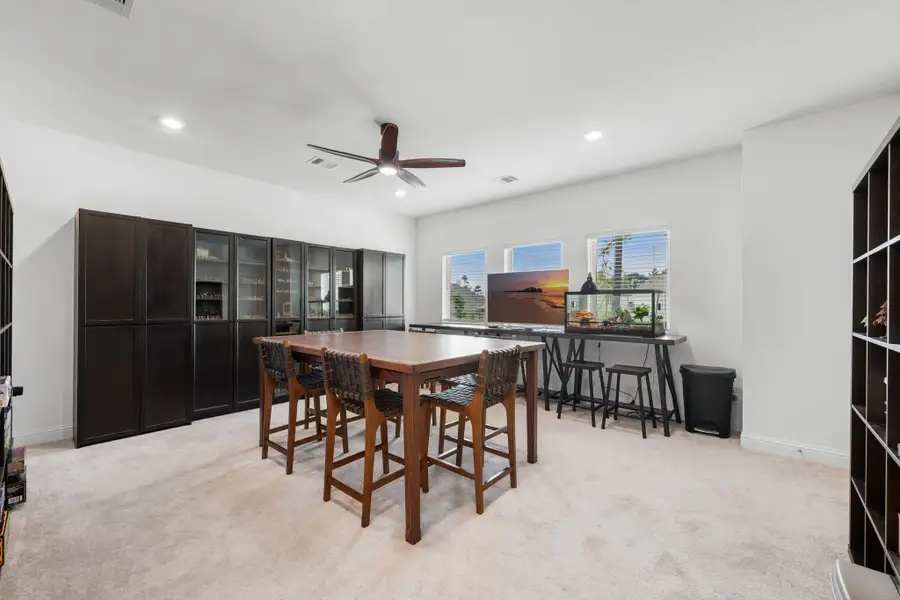 Furnished interior view inside a new home in The Highlands: Pinnacle Collection, Porter Heights (Image 3).