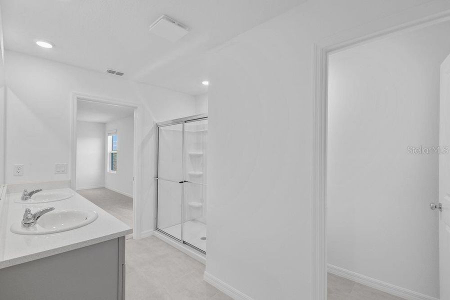 Furnished interior view inside a new home in Waterstone, Groveland (Image 17). Furnished interior view inside a new home in Waterstone, Groveland (Image 17).