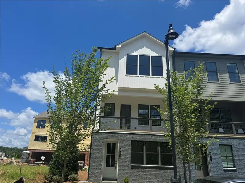 Front exterior of a new home in , Alpharetta, GA, highlighting curb appeal (Image 2). Front exterior of a new home in , Alpharetta, GA, highlighting curb appeal (Image 2).