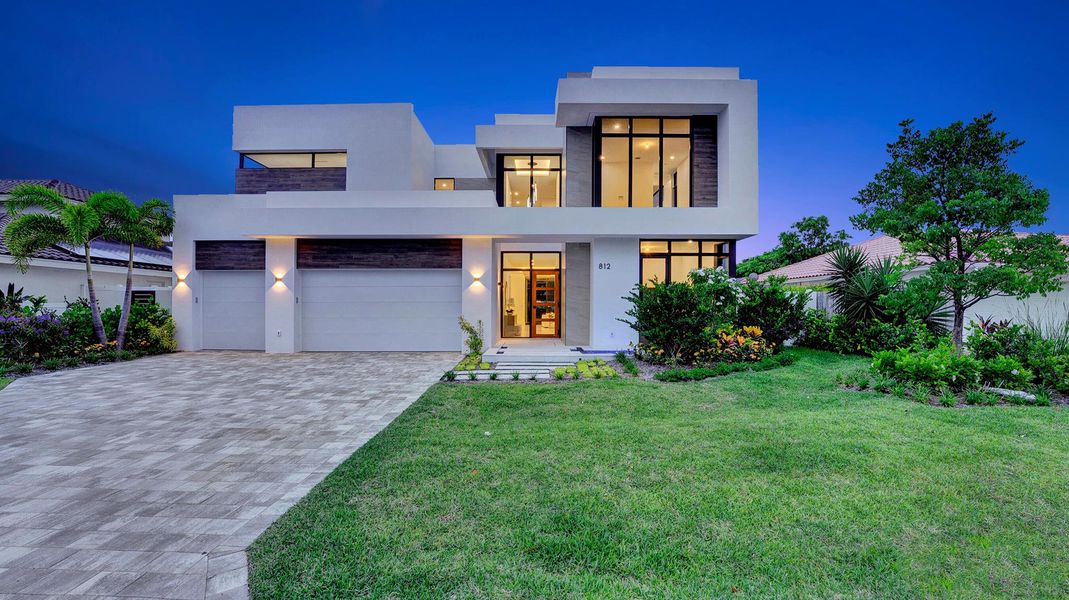 Front exterior of a new home in , Boca Raton, FL, highlighting curb appeal (Image 1). Front exterior of a new home in , Boca Raton, FL, highlighting curb appeal (Image 1).