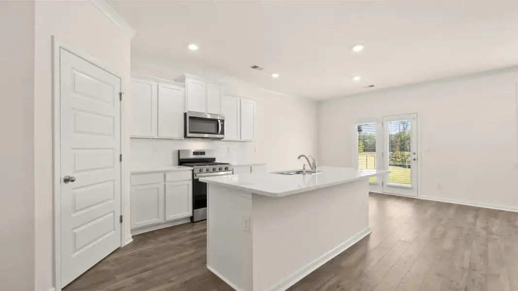 Furnished interior view inside a new home in The Highlands at Cedar Hill Landing, Navassa (Image 4).