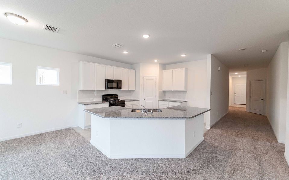 Furnished interior view inside a new home in Hunter's Ranch, San Antonio (Image 6).