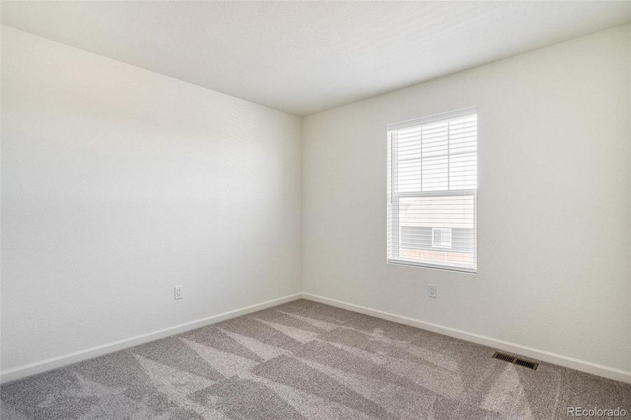 Spacious, unfurnished interior of a new home in Farmlore, Brighton (Image 28).