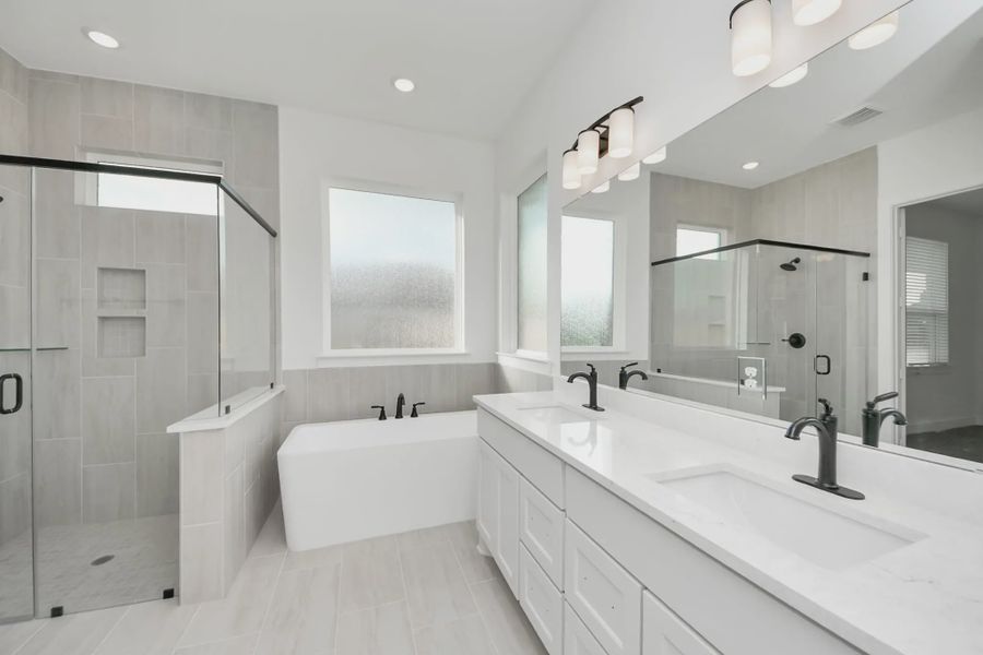 Representative furnished interior of a home built from the Bonneville by Chesmar Homes in Meridiana 50's and 60's, Manvel (Image 13).
