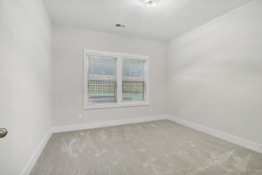 Representative unfurnished interior of a home built from the Ariel II by Great Southern Homes in Collins Cove, Chapin (Image 46).