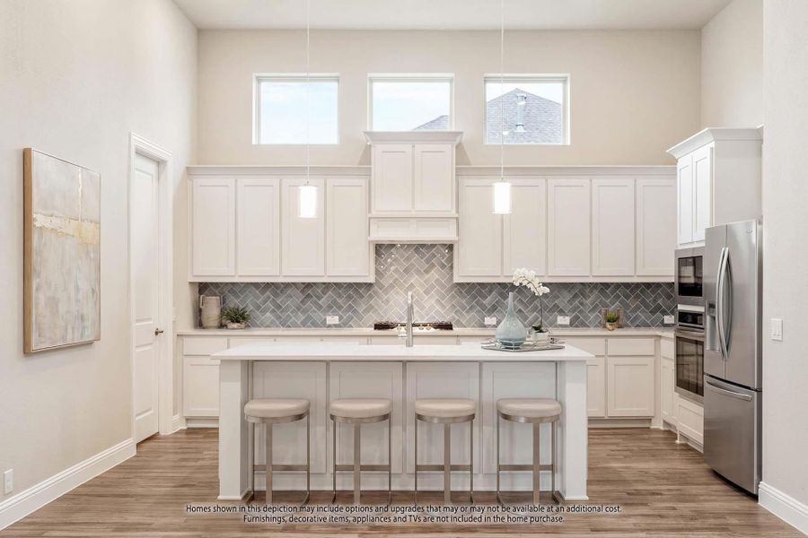 Kitchen with white cabinets, herringbone tile backsplash, center island with four stools, and stainless steel appliances Kitchen with white cabinets, herringbone tile backsplash, center island with four stools, and stainless steel appliances