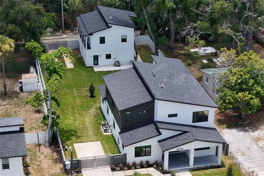 Front exterior of a new home in , St. Petersburg, FL, highlighting curb appeal (Image 28). Front exterior of a new home in , St. Petersburg, FL, highlighting curb appeal (Image 28).