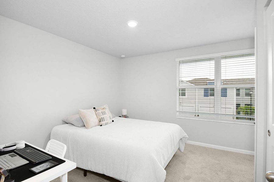 Furnished interior view inside a new home in Edgewater Pointe, Stuart (Image 7).