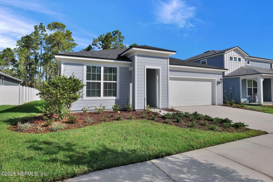 Front exterior of a new home in Bradley Creek, Green Cove Springs, FL, highlighting curb appeal (Image 24).