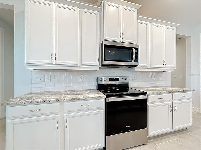 Furnished interior view inside a new home in , Port Charlotte (Image 9).
