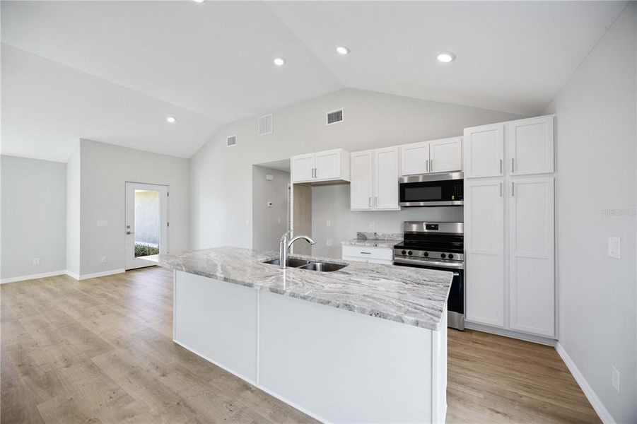 Furnished interior view inside a new home in , North Port (Image 6).