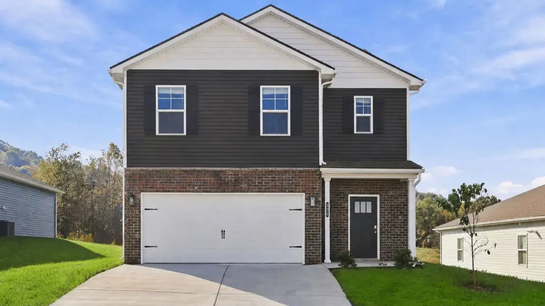 Front exterior of a new home in Fieldcrest Acres, Blountville, TN, highlighting curb appeal (Image 1). Front exterior of a new home in Fieldcrest Acres, Blountville, TN, highlighting curb appeal (Image 1).