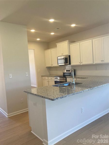 Furnished interior view inside a new home in Sunset Meadows, Charlotte (Image 5).
