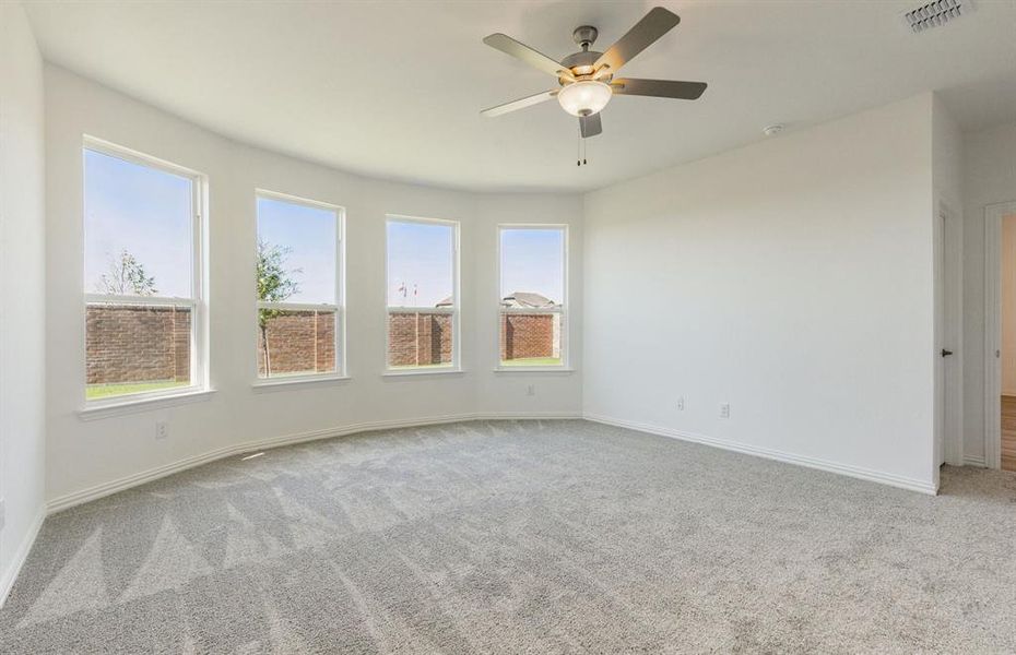 Elegant owner's suite with Bay window *real home pictured