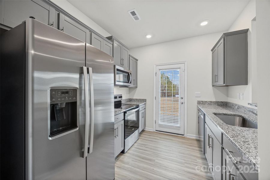 Furnished interior view inside a new home in , York (Image 8).