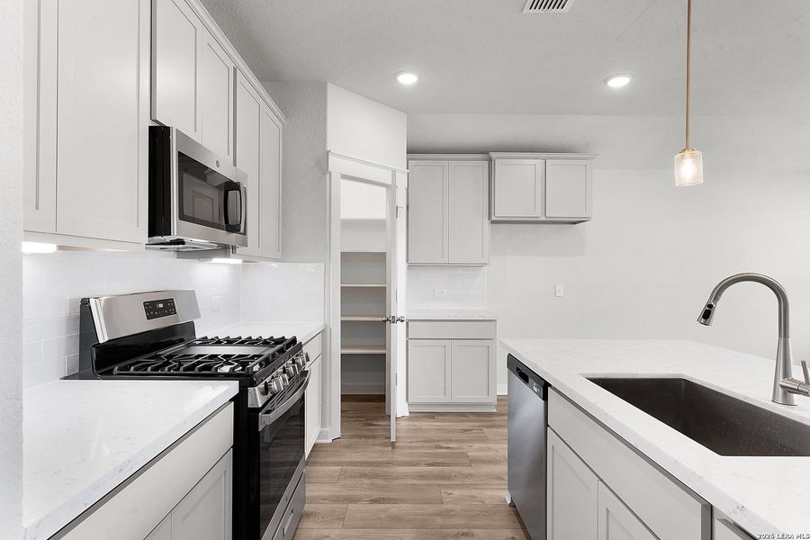 Furnished interior view inside a new home in Prairie Green, Converse (Image 6).
