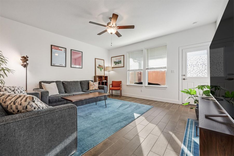 The living room is not just a place to sit, but a room that invites you to stretch out, read, entertain, or let the day slow down