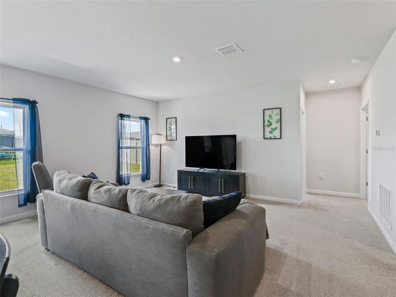 Furnished interior view inside a new home in , Sumterville (Image 16).