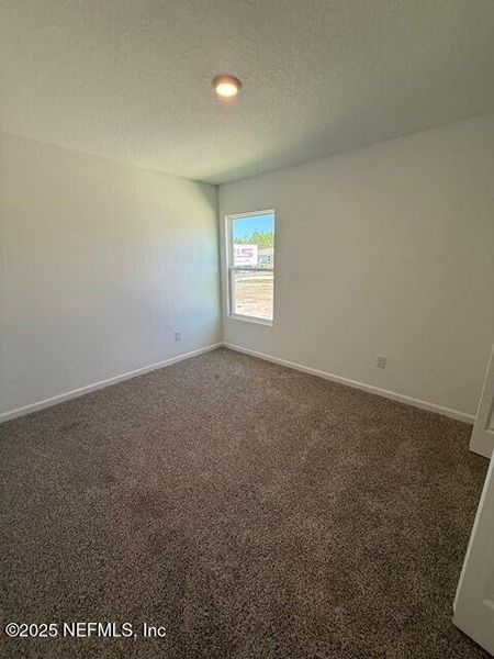 Spacious, unfurnished interior of a new home in Grand Reserve, Bunnell (Image 36).