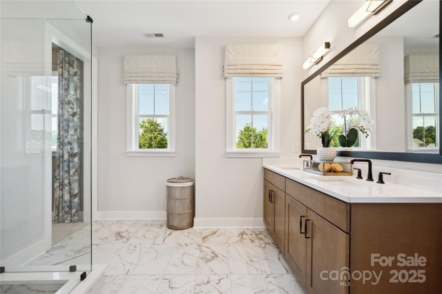 Dual vanity and premium finishes is what this space deserves. *Model Photos | actual finishes, structural selections, and orientation may vary.
