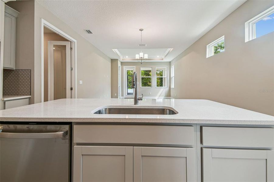 Furnished interior view inside a new home in Fairway Pointe - 55+ Villa Community, Sun City Center (Image 6).